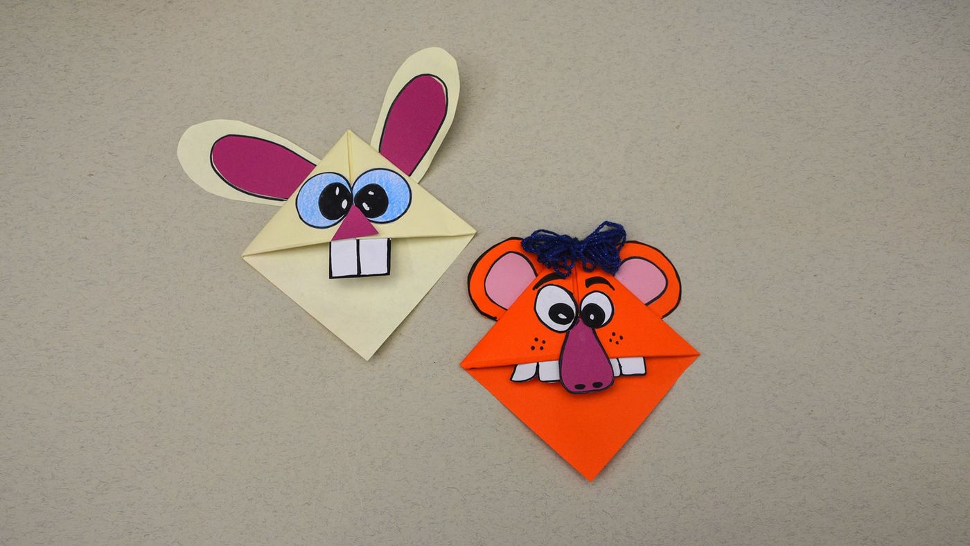 Krem rengi tavşan ve turuncu ayı origami kuklalar, pembe kulak içleri ve iri gözleriyle