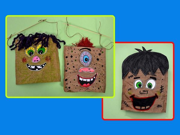 Kağıt poşetten Halloween kuklaları: mor ve kırmızı yün saçlı iki ipli canavar ve siyah saçlı el kuklası