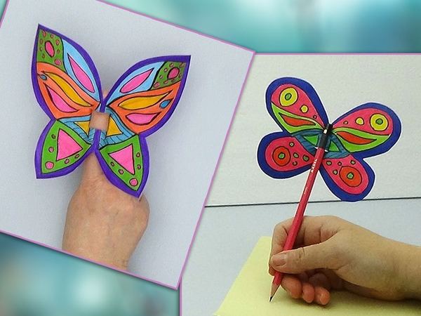 Kağıt kelebek kukla ve kelebek kalem süsü: parmağa takılan desenli kelebek ile kurşun kaleme geçirilmiş kırmızı kelebek